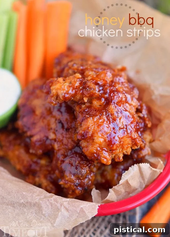 Plated Honey BBQ Chicken Strips, beautifully glazed and ready to be served, showcasing their perfect texture and vibrant color.