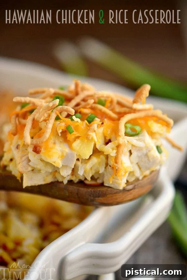 The fully assembled Hawaiian Chicken and Rice Casserole, topped with crispy chow mein noodles, ready for baking.