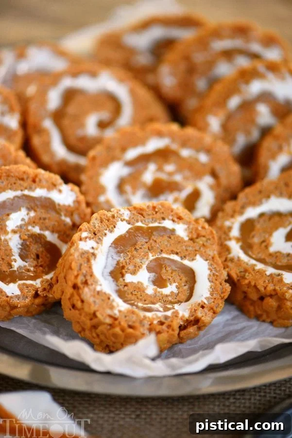 Layers of caramel, pumpkin spice Rice Krispies, and marshmallow creme make these pinwheels a unique and festive fall dessert. A perfect blend of sweet and spice!