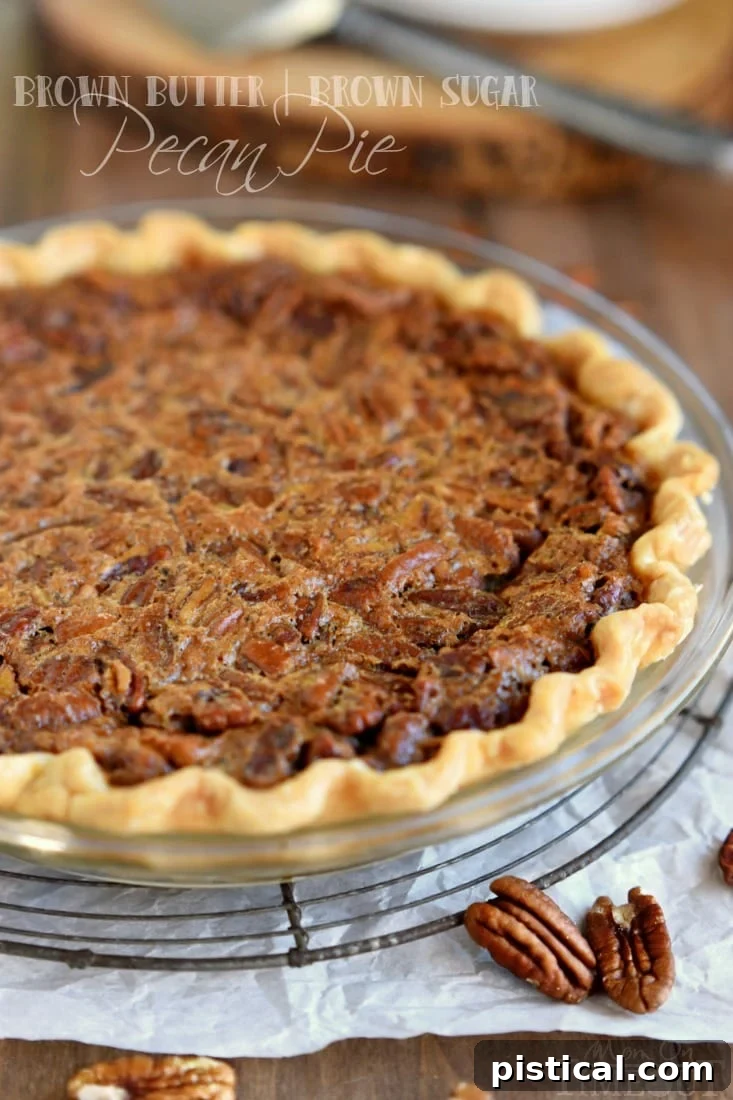 Whole Brown Sugar Pecan Pie cooling on a wire rack, ready for holiday serving