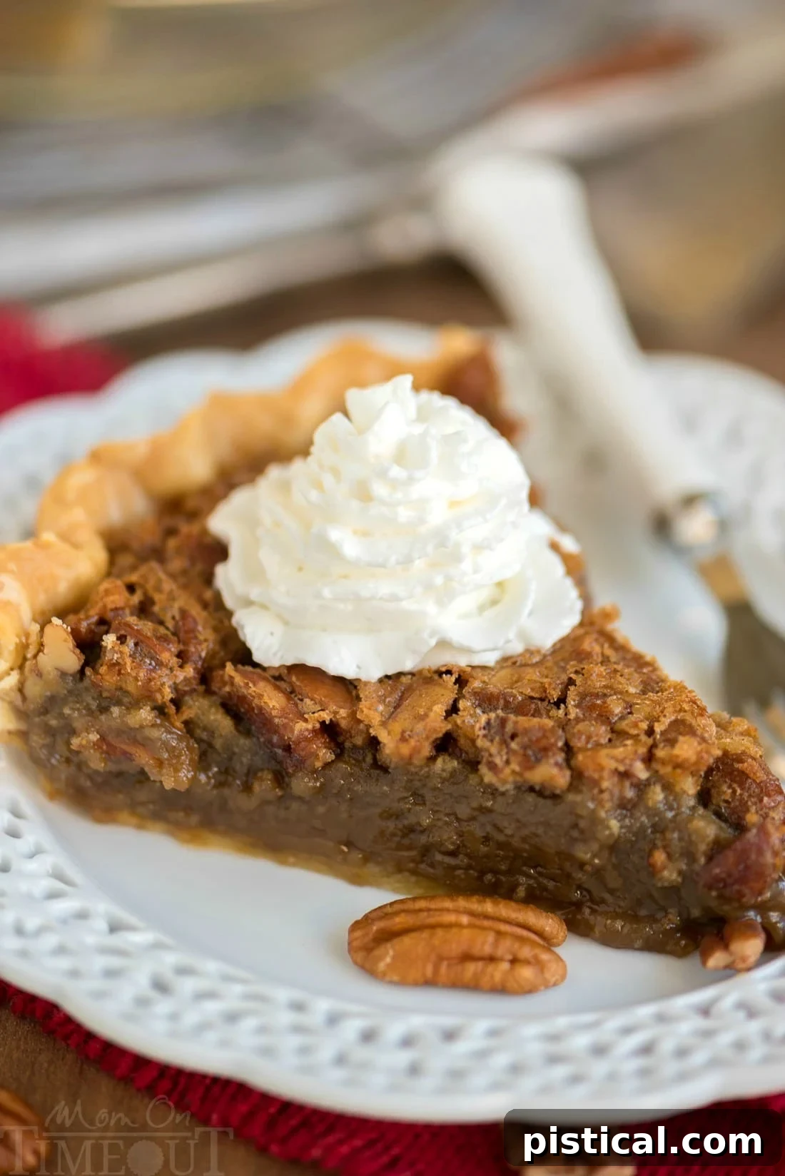 A slice of brown sugar pecan pie on a white plate, highlighting its rich texture and golden brown crust