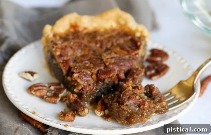 Wide angle view of a delicious brown sugar pecan pie recipe, beautifully golden and ready to serve