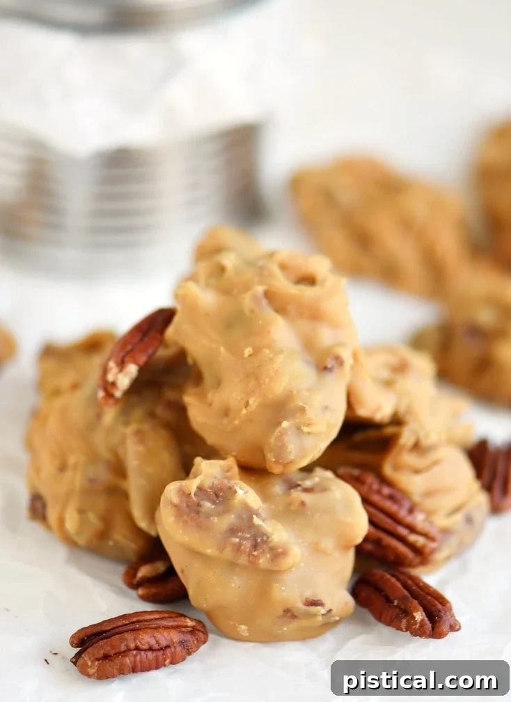 Velvet Buttermilk Pecan Pralines 3 Another enticing close-up of Buttermilk Pecan Pralines, showing the rich, caramelized sugar and abundant pecan halves, ready to be enjoyed as a holiday treat.