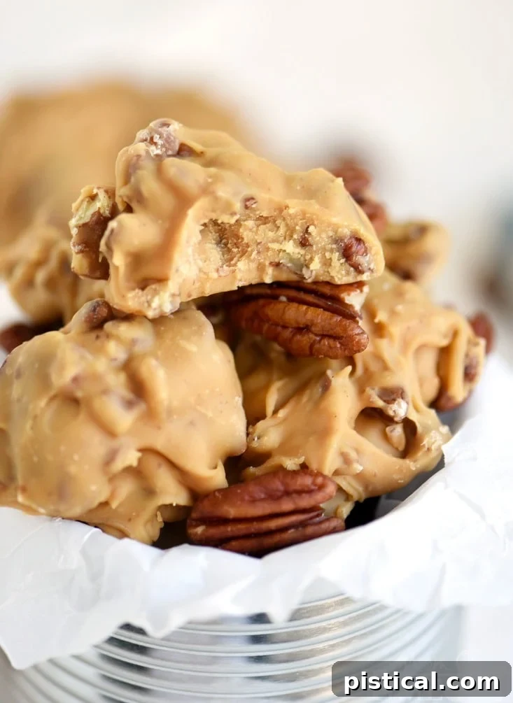 Velvet Buttermilk Pecan Pralines 4 A hand stirring the thick, creamy Buttermilk Pecan Praline mixture in a large pot before it sets, illustrating the essential beating step for achieving the perfect consistency.