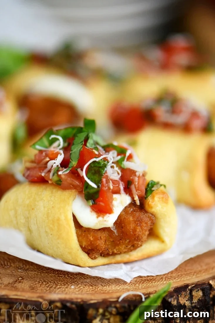 Close-up of Parmesan Shrimp Bruschetta Bites before baking, showing shrimp and mozzarella wrapped in crescent rolls.