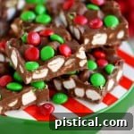 A close-up of M&M's Marshmallow Dream Bars, showcasing the texture and colorful M&M's.