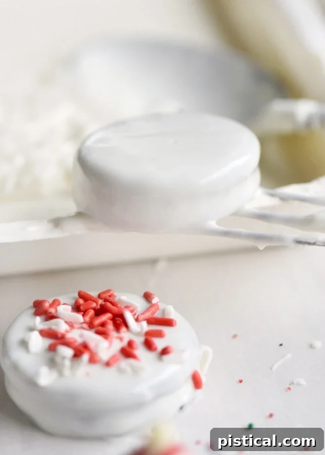 Everything you need to master Dipped Oreos this Christmas! Follow my easy how-to instructions and tips for gourmet holiday treats in no time. // Mom On Timeout #holidays #christmas #oreos #dippedoreos #candy #cookies #cookietray #dessert #easy An array of candy dipping tools, including a three-pronged fork, a swirling spoon, and a two-pronged fork, essential for making perfect dipped Oreos.