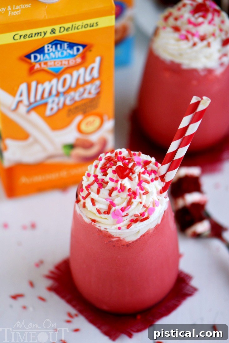 This Skinny Red Velvet Shake is the perfect treat for Valentine's Day or whenever you need a little something special. Topped with a decadent cream cheese whipped cream, this skinny shake is hard to resist! Great for breakfast or dessert!