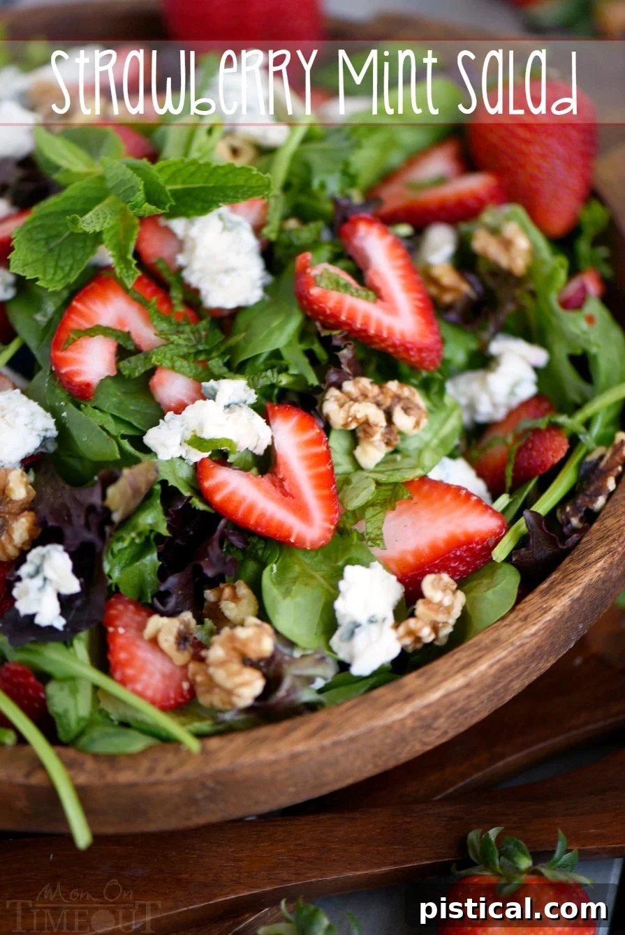 A vibrant and fresh Strawberry Spinach Salad, showcasing its beautiful ingredients