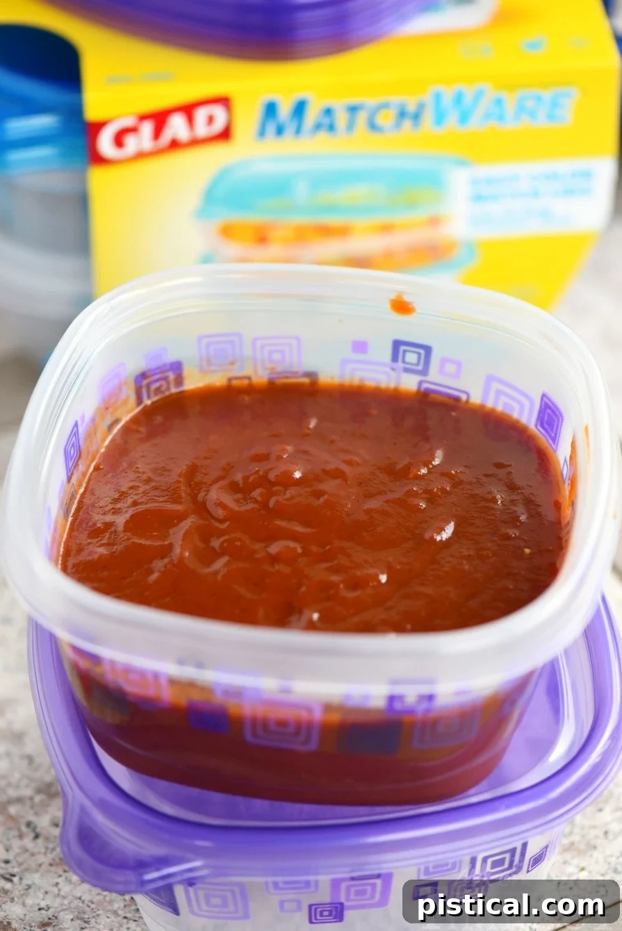 Dr Pepper Barbecue Sauce simmering on the stove, ready to be paired with smoked brisket