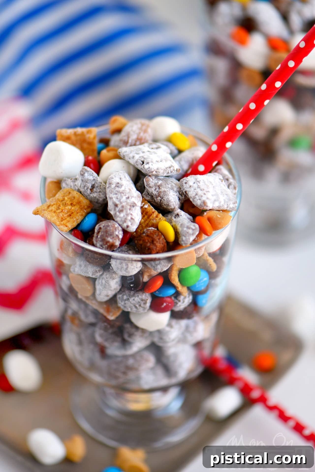 Bowl of Monster S'mores Muddy Buddies with various cereals and toppings