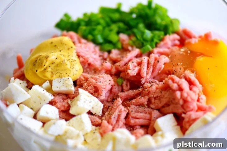 Ingredients for Inside Out Turkey Cheeseburgers: ground turkey, mozzarella, green onions, Dijon, Worcestershire, egg, pepper.