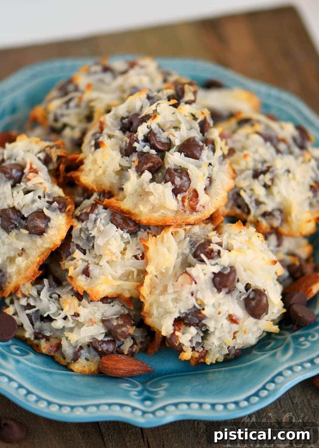Simple Four Ingredient Coconut Almond Chocolate Cookies 3 These easy Almond Joy Cookies take just four ingredients and don't even require a mixer! No beating, no chilling, just mix 'em up and throw 'em in the oven EASY! You're going to love these ooey gooey fabulous cookies!