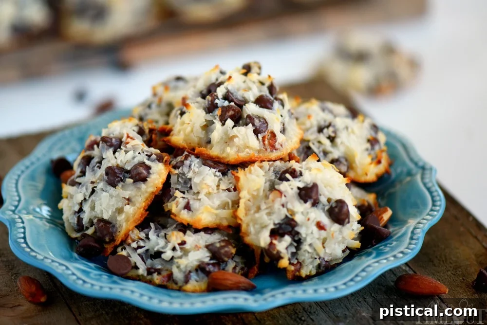 Simple Four Ingredient Coconut Almond Chocolate Cookies 4 These easy Almond Joy Cookies take just four ingredients and don't even require a mixer! No beating, no chilling, just mix 'em up and throw 'em in the oven EASY! You're going to love these ooey gooey fabulous cookies!
