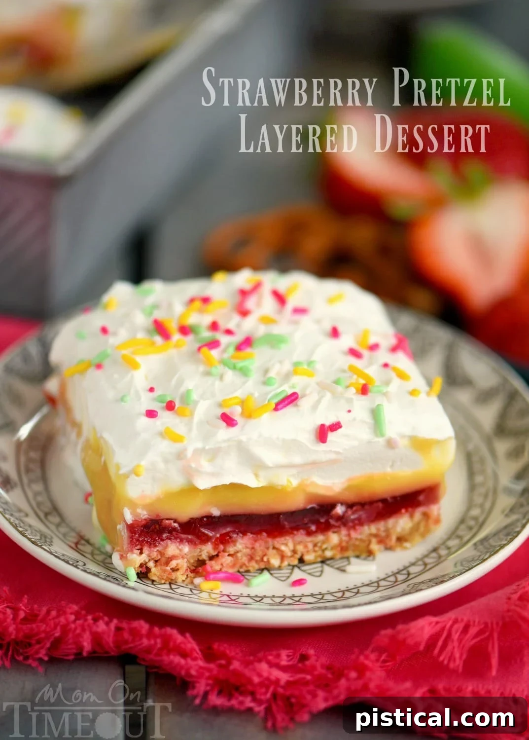 This easy No Bake Strawberry Pretzel Layered Dessert is sure to become a new family favorite! A graham cracker-pretzel crust is topped with a sweet strawberry jell-o layer, rich vanilla pudding and creamy whipped topping! Don't forget the sprinkles!