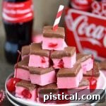 Small square of Cherry Coke Fudge, showcasing the layered texture
