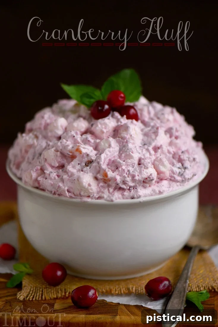 Light and fluffy Cranberry Fluff, a sweet and tart no-bake holiday dessert.