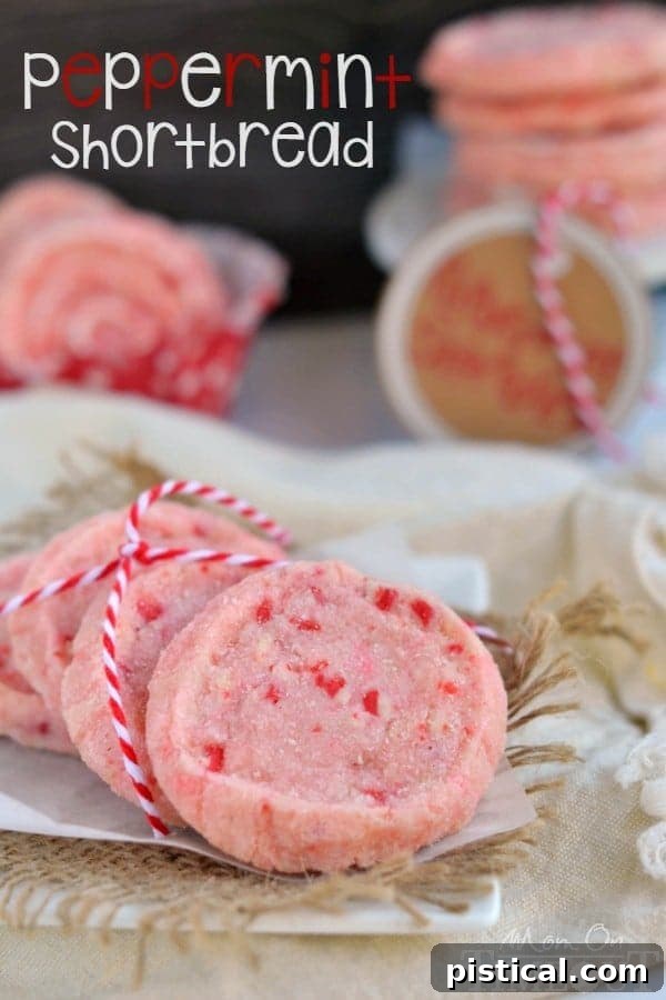 Delicate Peppermint Shortbread Cookies with red and white twine, placed on parchment paper.