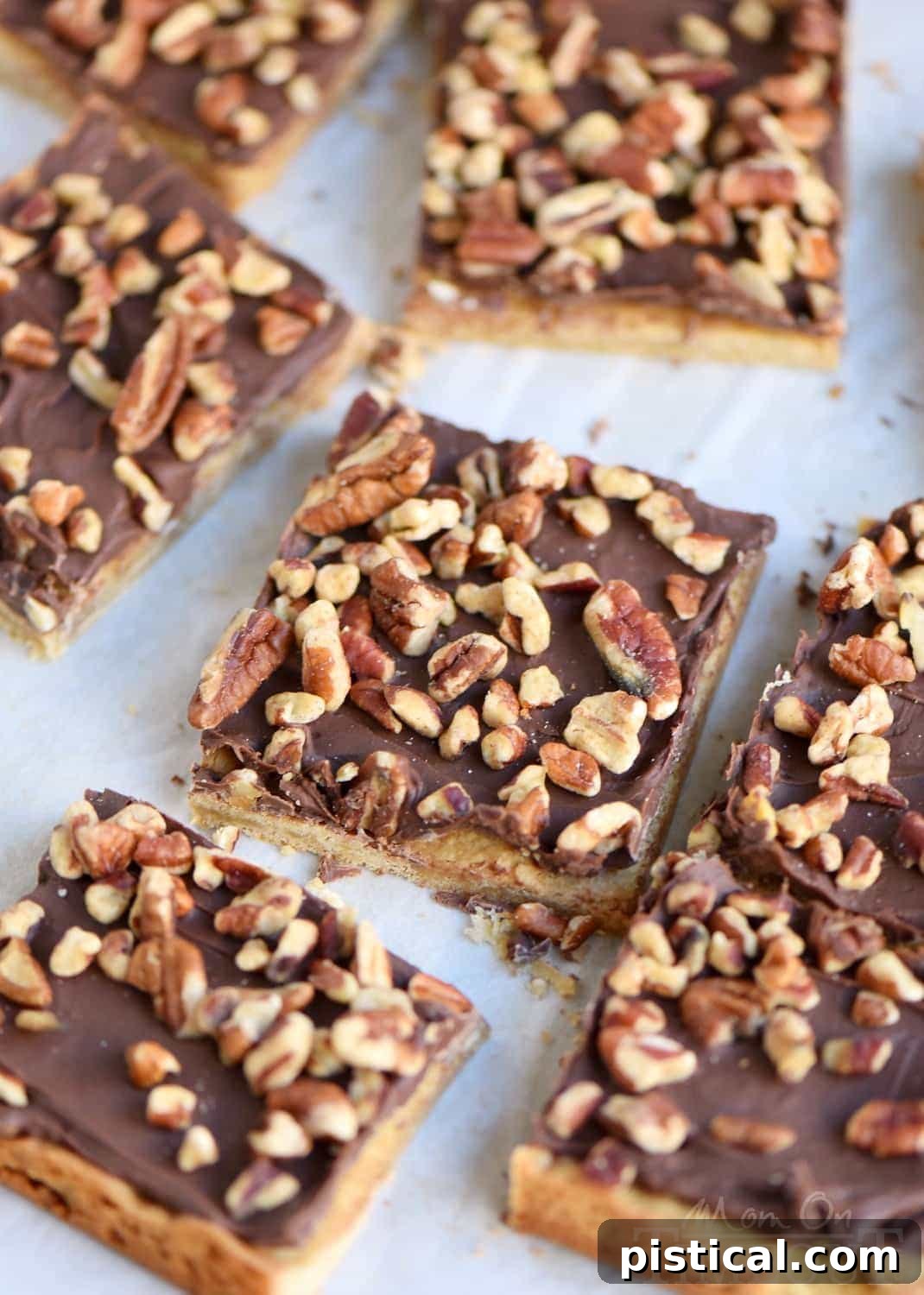 A vibrant second shot of Easy Toffee Bars, showcasing their golden crust, rich chocolate topping, and generous pecan sprinkle. Perfect for any gathering or a cozy dessert.
