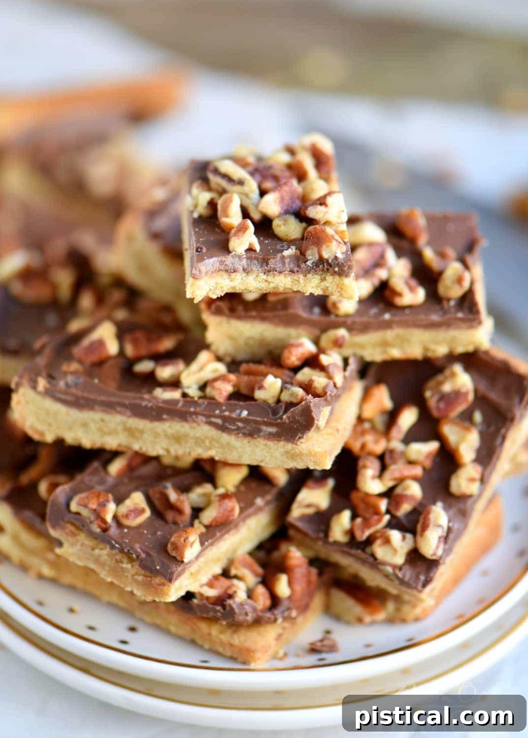 Another enticing image of Easy Toffee Bars, beautifully cut and arranged, highlighting the layers of cookie, chocolate, and nuts. A perfect treat for any dessert lover.