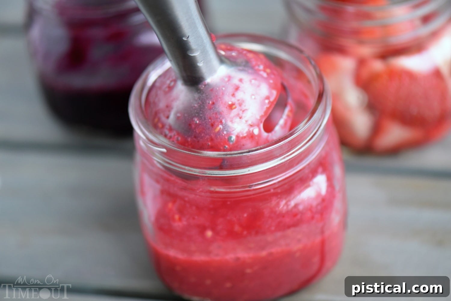 Beautiful, vibrant berry purees ready to be strained for a smooth and elegant champagne punch, ideal for holiday parties.