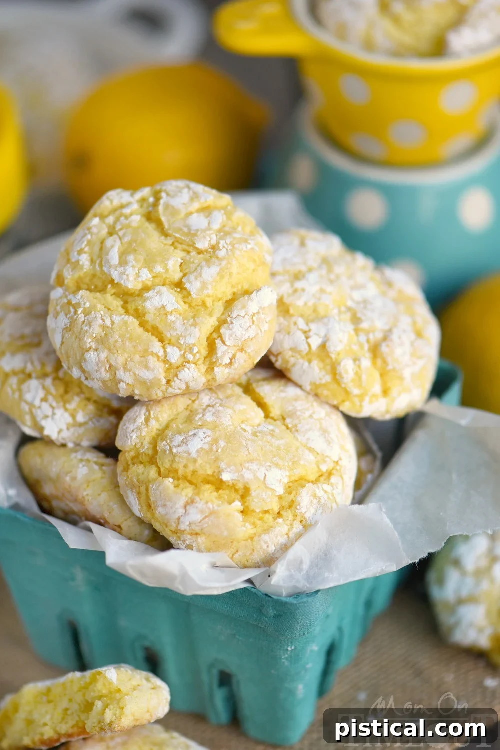 A basket full of homemade Lemon Whippersnaps, dusted with powdered sugar, ready to be enjoyed.