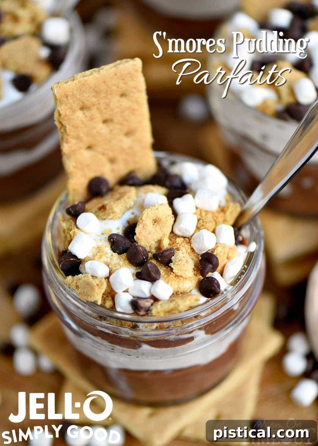 Delicious S'mores Pudding Parfaits layered with chocolate pudding, marshmallow creme, and graham crackers in a glass jar.
