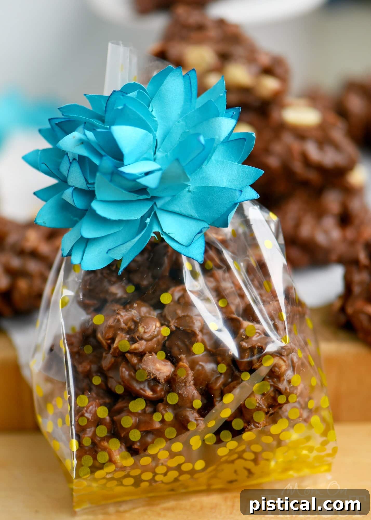 Golden Toffee Peanut Delights 5 A tempting pile of finished Toffee Peanut Clusters ready for packaging, showcasing their golden brown toffee and rich chocolate coating.