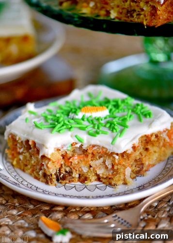 Deliciously moist carrot cake bars topped with smooth and tangy cream cheese frosting, an easy individual serving dessert for Easter.