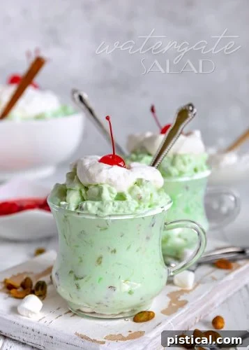 Vibrant green Watergate Salad, also known as Pistachio Fluff, a light and creamy dessert salad perfect for Easter.