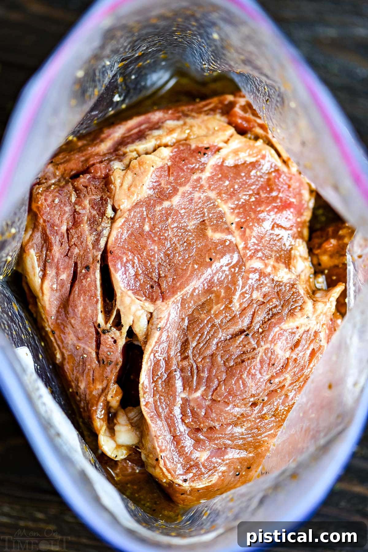 Steak marinating in a large ziploc bag, ready for grilling or pan-searing.