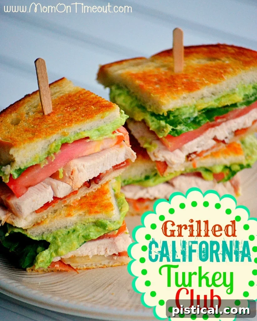 turkey club sandwich with avocado and bacon on small lunch plate