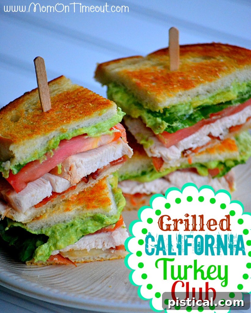 turkey club sandwich with avocado and bacon on small lunch plate