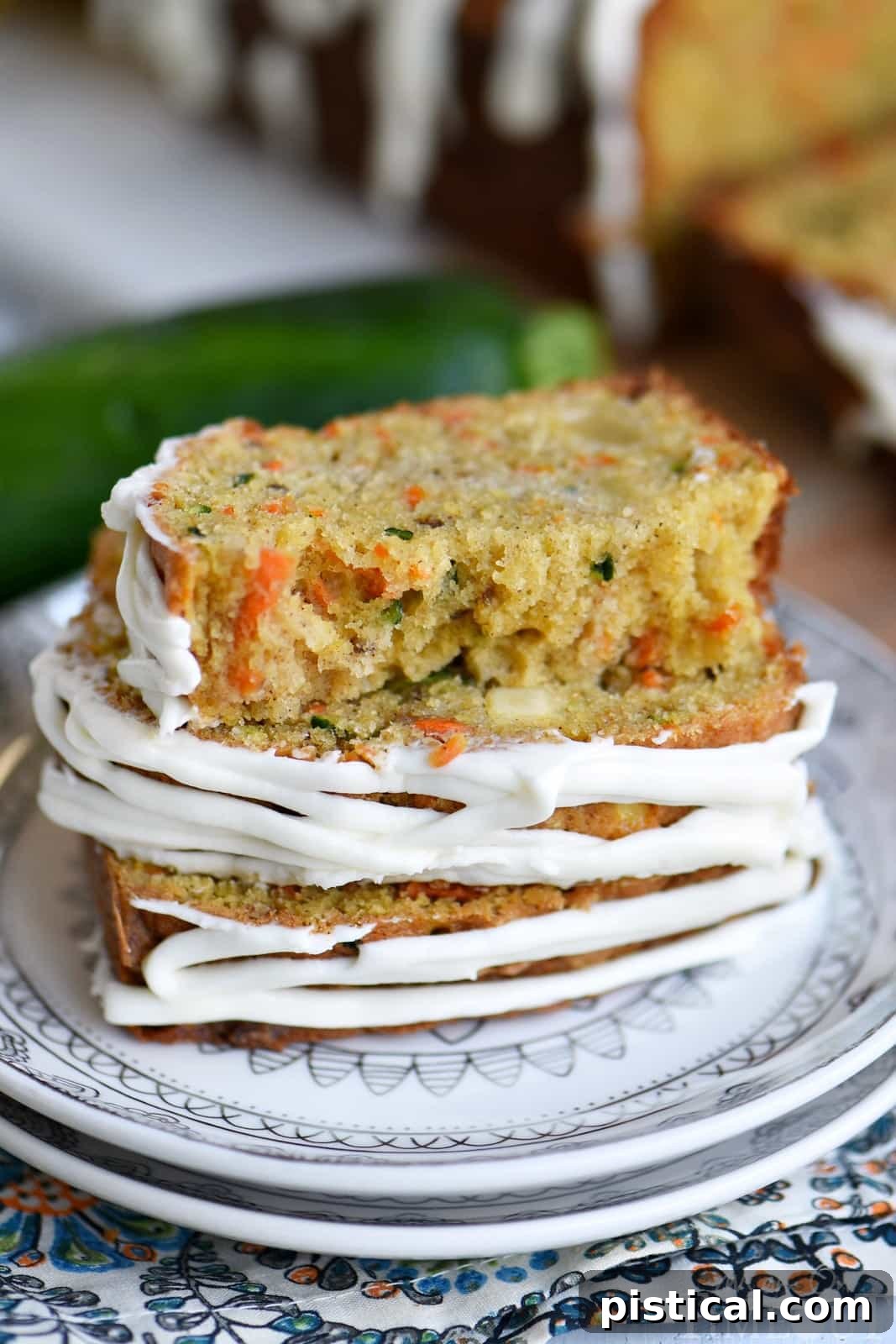 Spiced Carrot Apple Zucchini Loaf 5 Two freshly baked loaves of Carrot Apple Zucchini Bread on a cooling rack