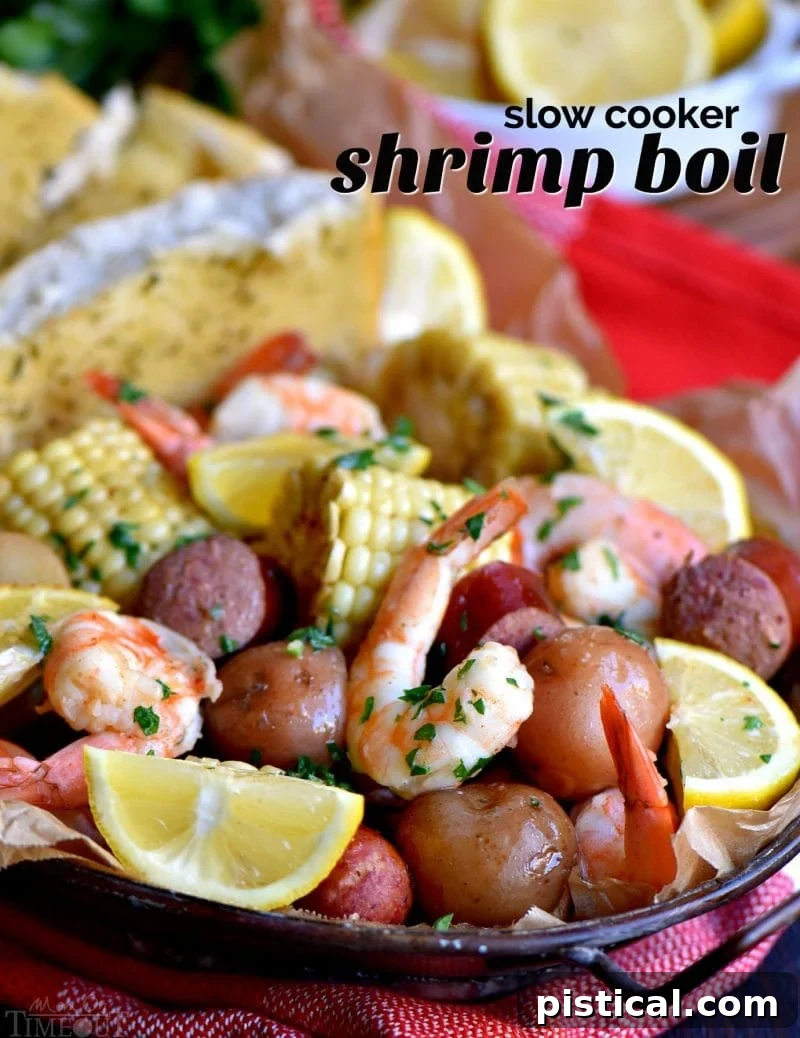 Easy Slow Cooker Shrimp Boil with potatoes, corn, sausage, and shrimp in a pot