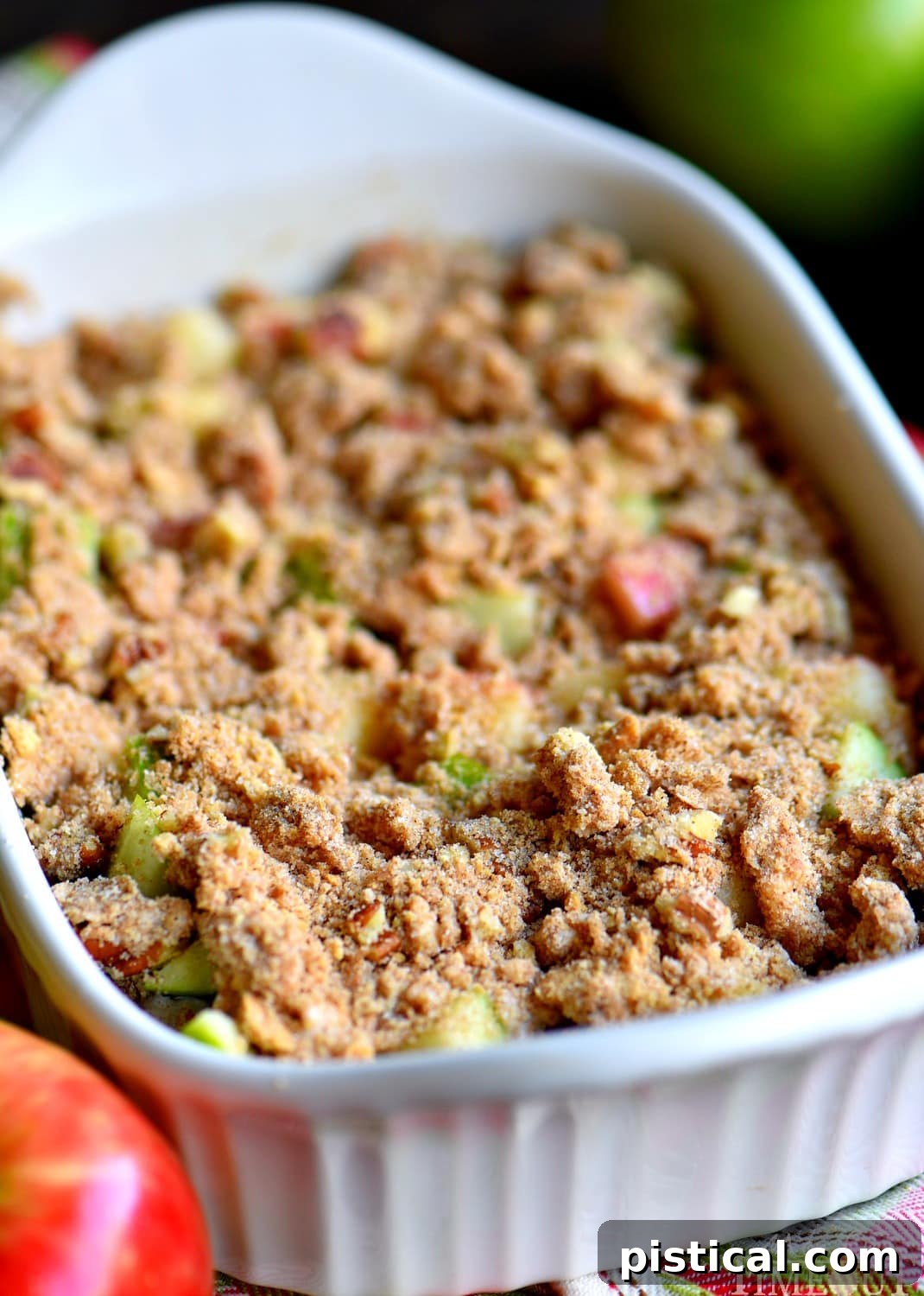 The Baked Apple Pie Dip perfectly topped with a golden streusel, ready to be served hot.