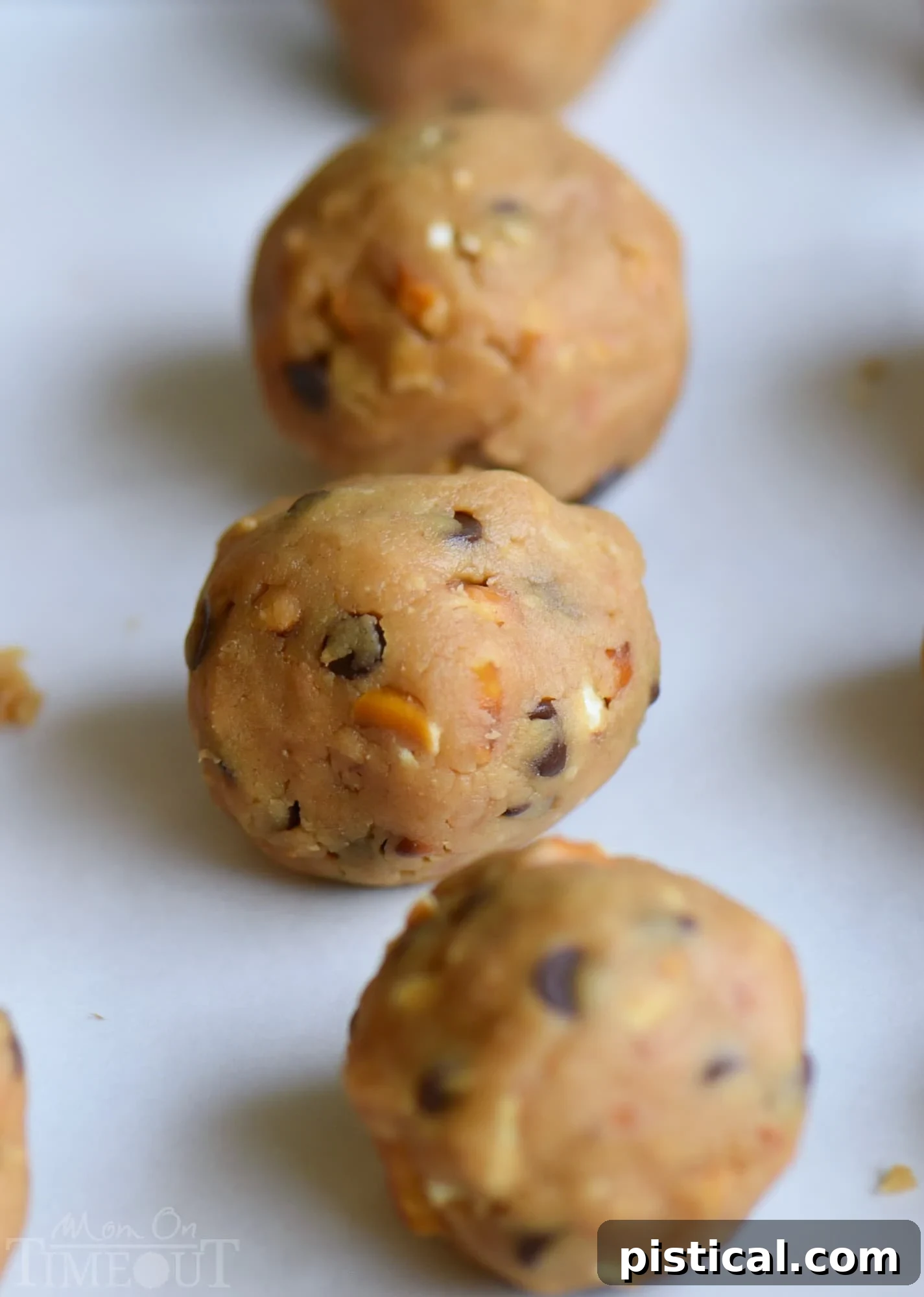 Delicious homemade Peanut Butter Pretzel Truffles, featuring a sweet and salty core dipped in rich chocolate. Ideal for holiday parties and easy to make.