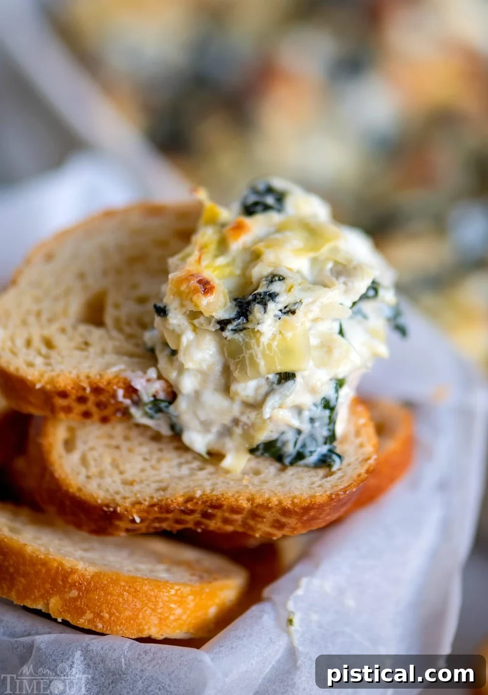 Delicious spinach artichoke dip, enriched with sweet roasted garlic.
