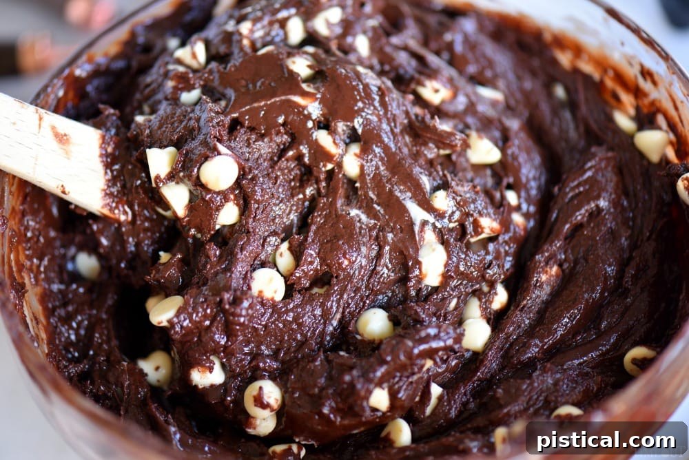 Decadent 5-Minute Dark Chocolate Raspberry Fudge 4 Ingredients for Dark Chocolate Raspberry Fudge, laid out on a surface.