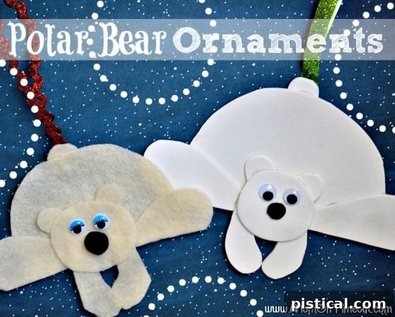 Handmade polar bear ornament with a red ribbon loop, hanging ready for display on a Christmas tree.