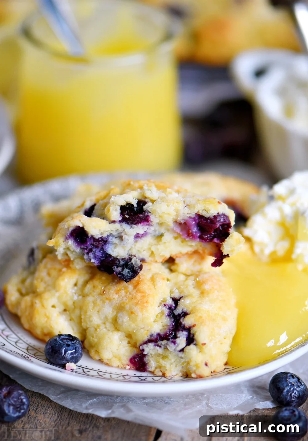 Zesty Lemon Blueberry Scones 7 Top-down view of blueberry scones with lemon zest
