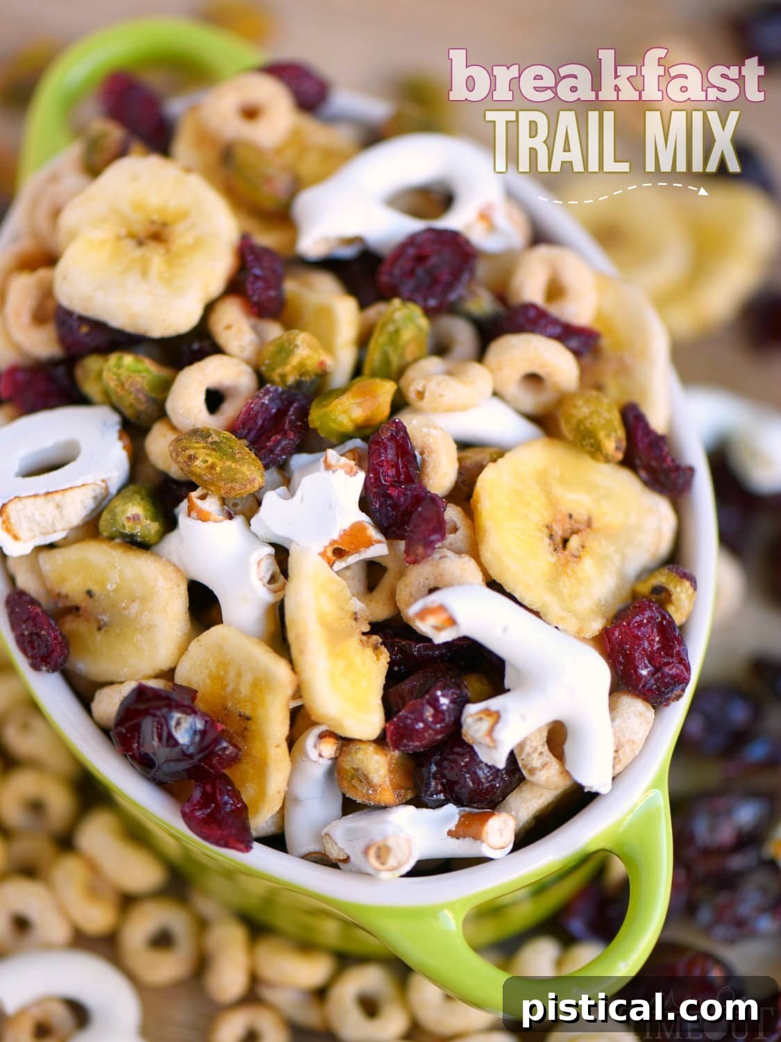 Easy Breakfast Trail Mix Recipe: A perfect blend of sweet, salty, and crunchy for busy mornings and energetic snacks. Customize your own blend! Delicious and easy homemade Breakfast Trail Mix with pistachios, dried cranberries, banana chips, yogurt pretzels, and Honey Nut Cheerios, perfect for quick mornings and healthy snacking.