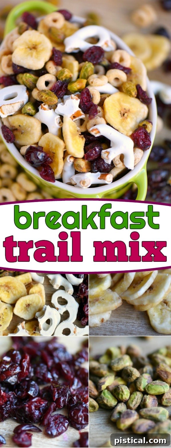 A vibrant and nutritious Breakfast Trail Mix, offering a perfect balance of sweet, salty, and crunchy for energy on the go. Tall container of Breakfast Trail Mix, showing the layers of colorful ingredients like dried fruit, nuts, cereal, and yogurt pretzels.