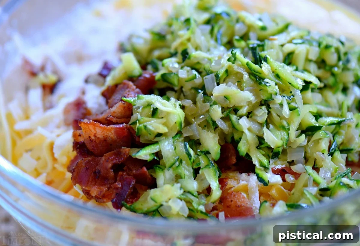 Shredded zucchini, bacon, and cheese mixture for quiche filling