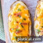 Twice baked potatoes on a serving board