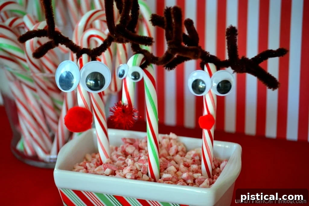 Candy Cane Reindeer Craft Display Idea Finished candy cane reindeer displayed in a bowl of peppermint crunch baking chips.
