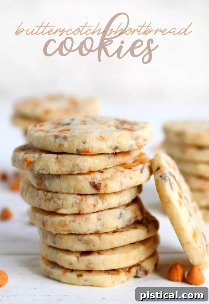 Stack of golden-brown butterscotch shortbread cookies on a white wooden background