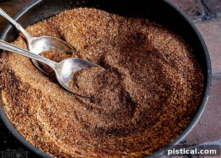 Freshly Mixed Homemade Taco Seasoning: A Perfect Blend of Pantry Staples Bowl filled with freshly mixed homemade taco seasoning ingredients, ready to be stored or used, showcasing the simplicity of the DIY blend.