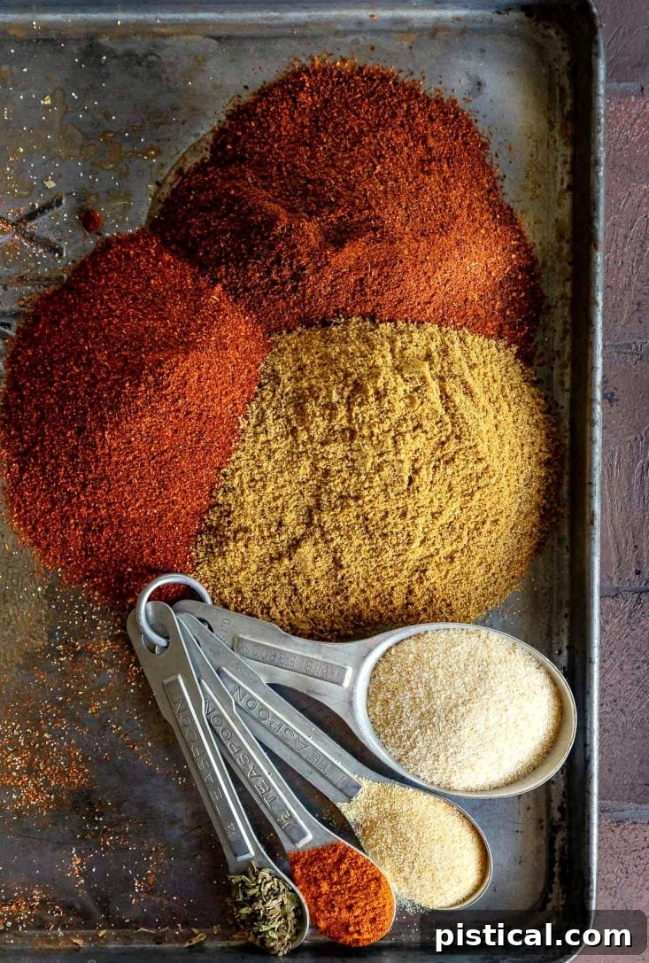 Vibrant Homemade Taco Seasoning: Ready to Flavor Your Favorite Dishes Homemade taco seasoning spread on a baking sheet, displaying its rich color and texture before storage or use, ready for a flavor-packed meal.