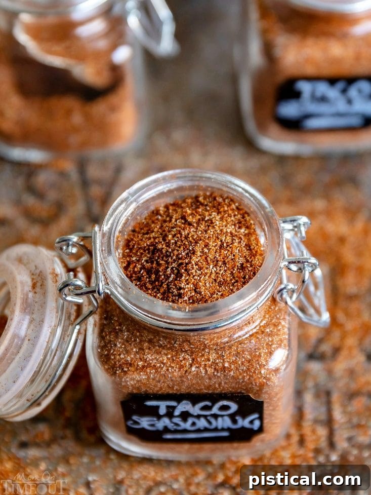 Ready-to-Use Homemade Taco Seasoning: A Pantry Must-Have Close-up, top-down view of homemade taco seasoning in a spice jar, showcasing its rich color and fine texture, perfect for any Mexican recipe.